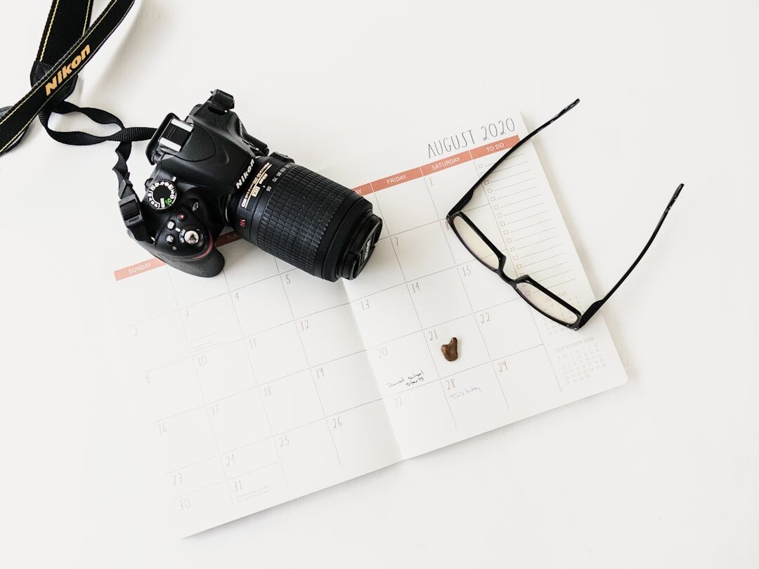 Professional camera and press equipment flat lay